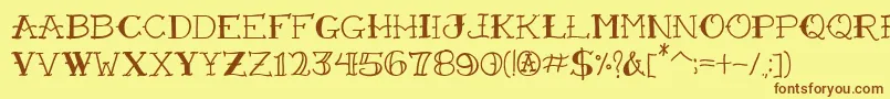 VtcFreehandtattooone Font – Brown Fonts on Yellow Background