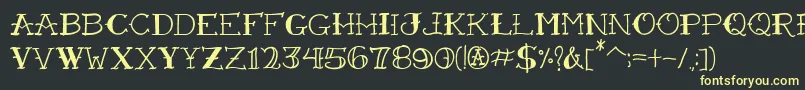 VtcFreehandtattooone Font – Yellow Fonts on Black Background