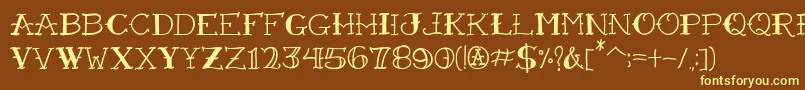 VtcFreehandtattooone Font – Yellow Fonts on Brown Background