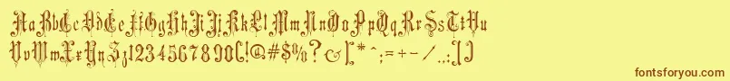 フォントMusicHallRegular – 茶色の文字が黄色の背景にあります。