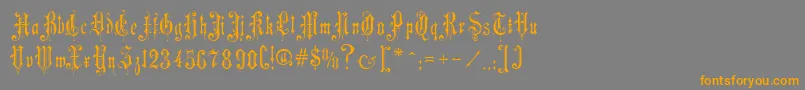 フォントMusicHallRegular – オレンジの文字は灰色の背景にあります。