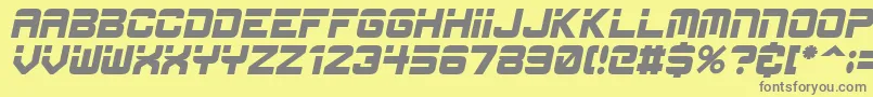 フォントEspItal – 黄色の背景に灰色の文字
