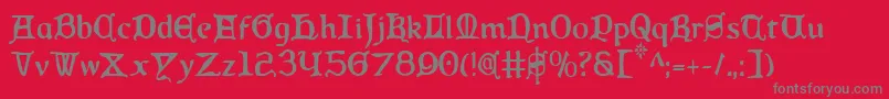 QueenCountryCondensed-fontti – harmaat kirjasimet punaisella taustalla