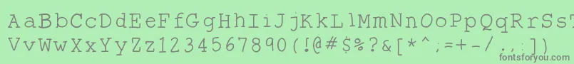 フォントTheantitype – 緑の背景に灰色の文字