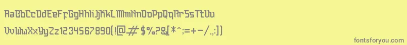 フォントBauchaomaicha – 黄色の背景に灰色の文字