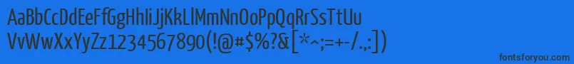 Шрифт YanonekaffeesatzRegular – чёрные шрифты на синем фоне
