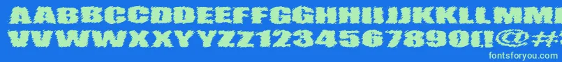 VtcAngorachikRegular Font – Green Fonts on Blue Background