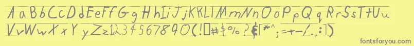 フォントKidtyperuled – 黄色の背景に灰色の文字