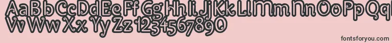 フォントPypats – ピンクの背景に黒い文字