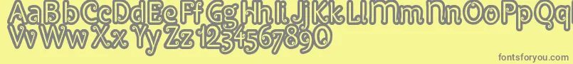 Pypats-fontti – harmaat kirjasimet keltaisella taustalla