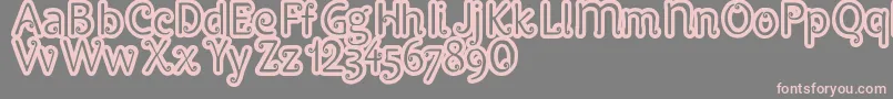 フォントPypats – 灰色の背景にピンクのフォント