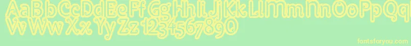 Pypats Font – Yellow Fonts on Green Background