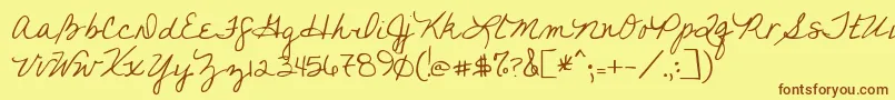 フォントYoufoundme – 茶色の文字が黄色の背景にあります。