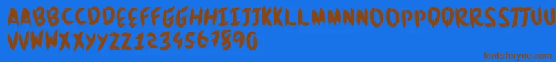 Brushingtons Font – Brown Fonts on Blue Background
