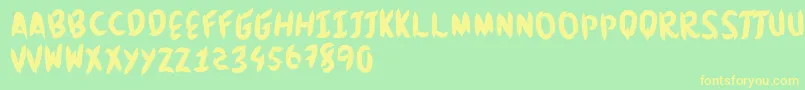 Brushingtons Font – Yellow Fonts on Green Background