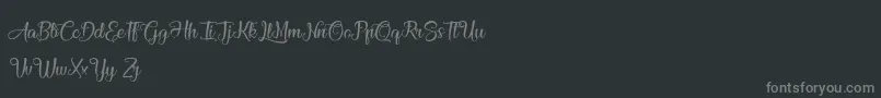 AthenaOfTheOcean-fontti – harmaat kirjasimet mustalla taustalla