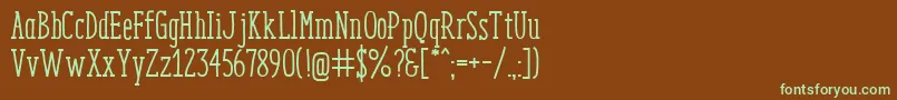 フォントEnyoSlabMedium – 緑色の文字が茶色の背景にあります。