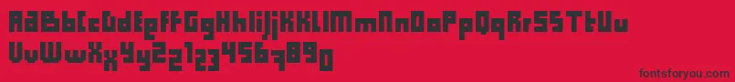 フォントComputerAidCondensedDker – 赤い背景に黒い文字
