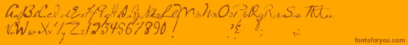 MtfFrozenSolid-fontti – ruskeat fontit oranssilla taustalla
