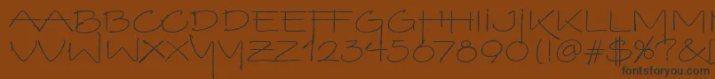 VinoBiancoItc Font – Black Fonts on Brown Background