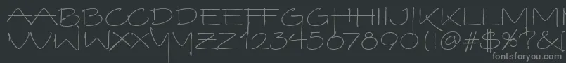 VinoBiancoItc-fontti – harmaat kirjasimet mustalla taustalla