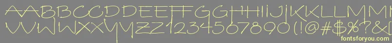 フォントVinoBiancoItc – 黄色のフォント、灰色の背景