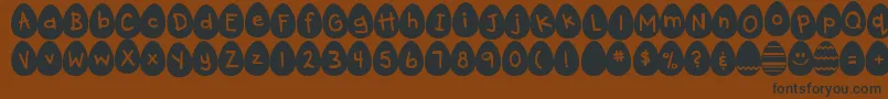 DjbEggsellentWobbly Font – Black Fonts on Brown Background
