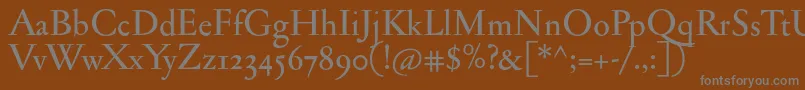 Jannonmedosf Font – Gray Fonts on Brown Background