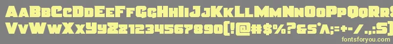 Justicestraight Font – Yellow Fonts on Gray Background