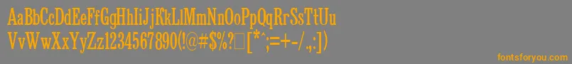 フォントBruskovayaCompressedPlain.001.001 – オレンジの文字は灰色の背景にあります。