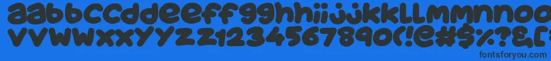 JuicyFruityPlain Font – Black Fonts on Blue Background