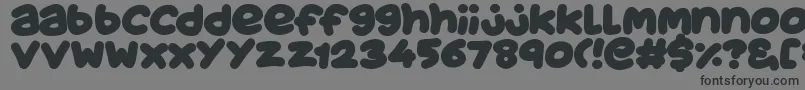 JuicyFruityPlain Font – Black Fonts on Gray Background