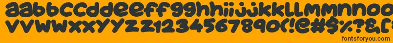 JuicyFruityPlain-Schriftart – Schwarze Schriften auf orangefarbenem Hintergrund