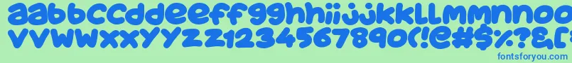 JuicyFruityPlain-Schriftart – Blaue Schriften auf grünem Hintergrund