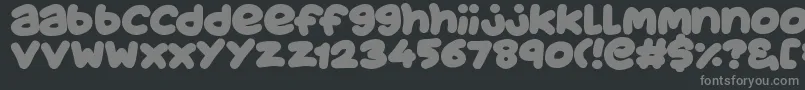フォントJuicyFruityPlain – 黒い背景に灰色の文字