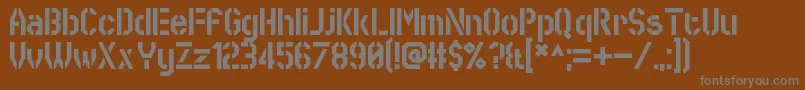 SworeGames-fontti – harmaat kirjasimet ruskealla taustalla