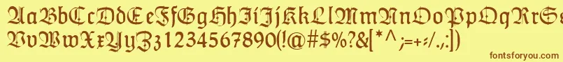 Шрифт HumboldtfrakturZierbuchstaben – коричневые шрифты на жёлтом фоне