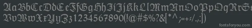 フォントHumboldtfrakturZierbuchstaben – 黒い背景に灰色の文字