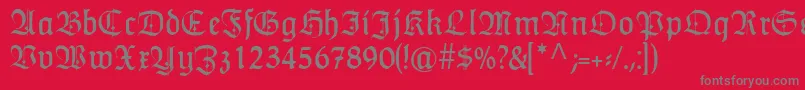 HumboldtfrakturZierbuchstaben Font – Gray Fonts on Red Background