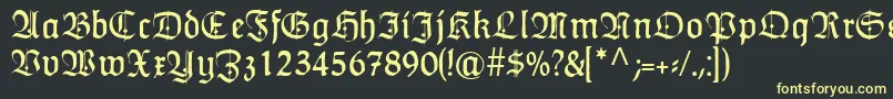 フォントHumboldtfrakturZierbuchstaben – 黒い背景に黄色の文字