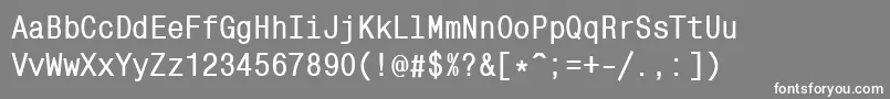 フォントMonocondensedcBold – 灰色の背景に白い文字