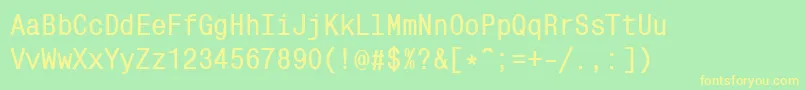 フォントMonocondensedcBold – 黄色の文字が緑の背景にあります