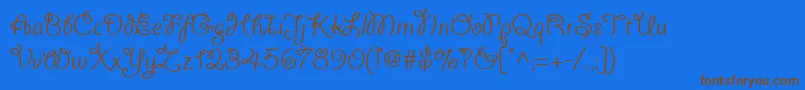 Шрифт Giddyupwebpro – коричневые шрифты на синем фоне