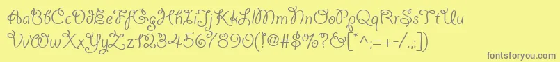 Giddyupwebpro Font – Gray Fonts on Yellow Background