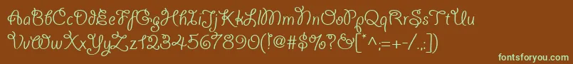 フォントGiddyupwebpro – 緑色の文字が茶色の背景にあります。