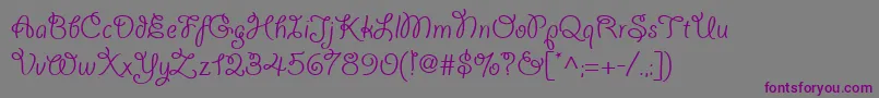 Шрифт Giddyupwebpro – фиолетовые шрифты на сером фоне
