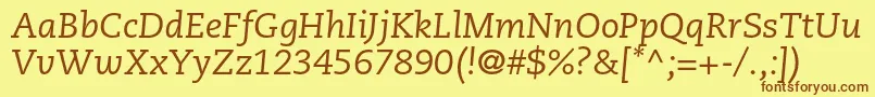 フォントCaecilialtstdItalic – 茶色の文字が黄色の背景にあります。