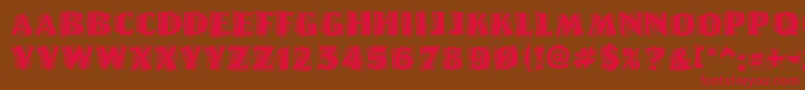 Linolettercutragged ffy Font – Red Fonts on Brown Background