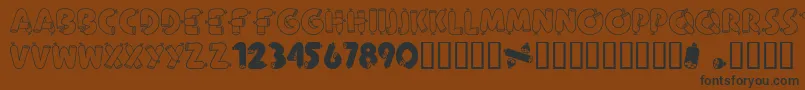 AlphaSausage Font – Black Fonts on Brown Background