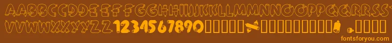 AlphaSausage-Schriftart – Orangefarbene Schriften auf braunem Hintergrund